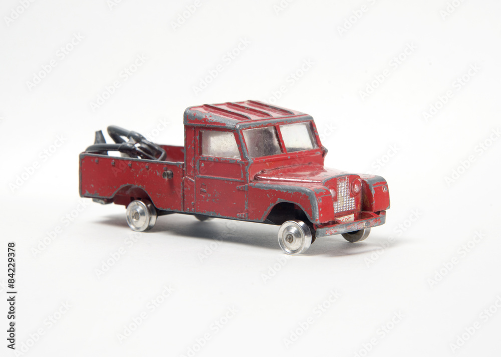Very battered old toy Series II Land Rover tow truck