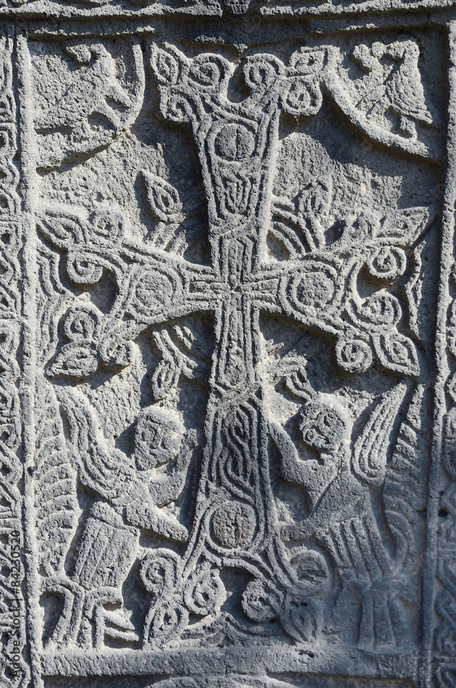 Stone carving,christian cross with mythical creatures,Armenia