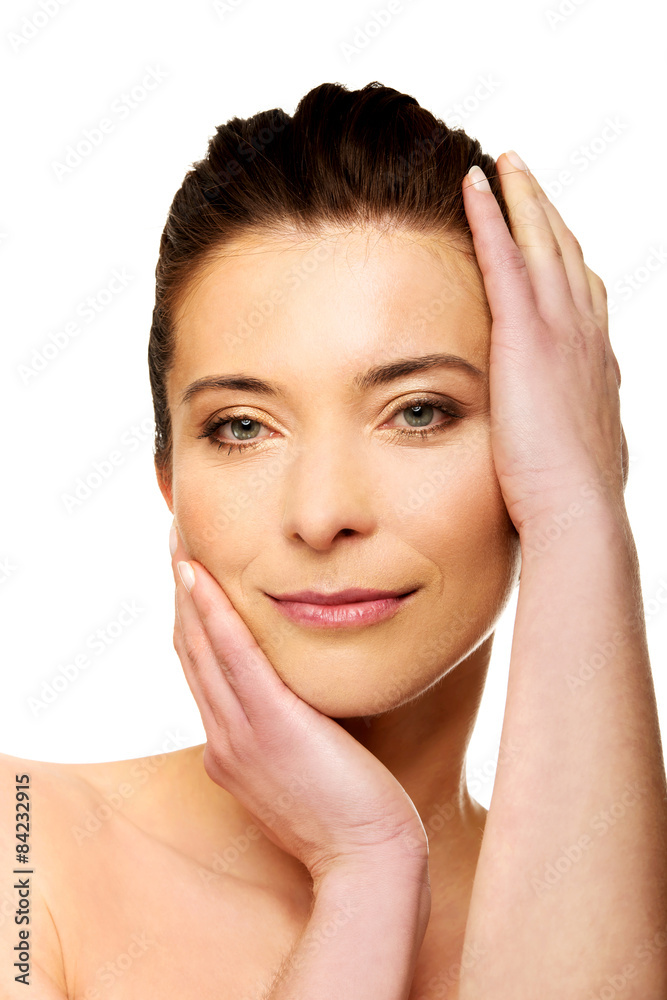 Spa woman with make up touching her face. Spa woman with make up touching her face.
