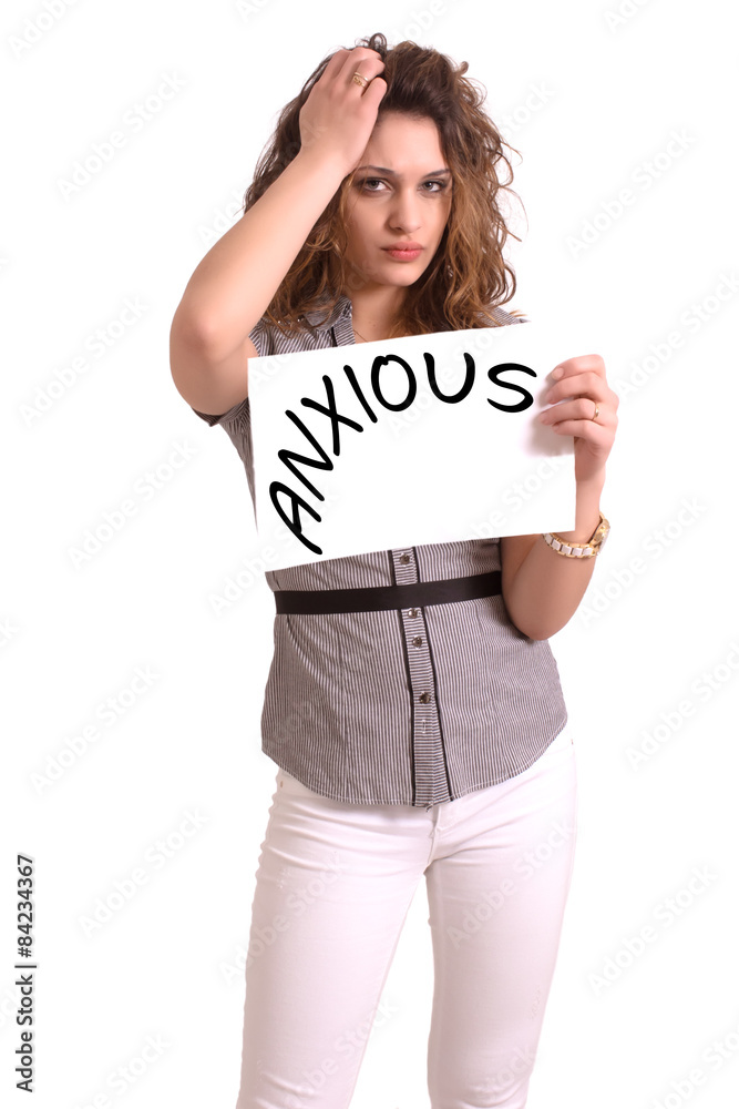 uncomfortable woman holding paper with Anxious text uncomfortable woman holding paper with Anxious text