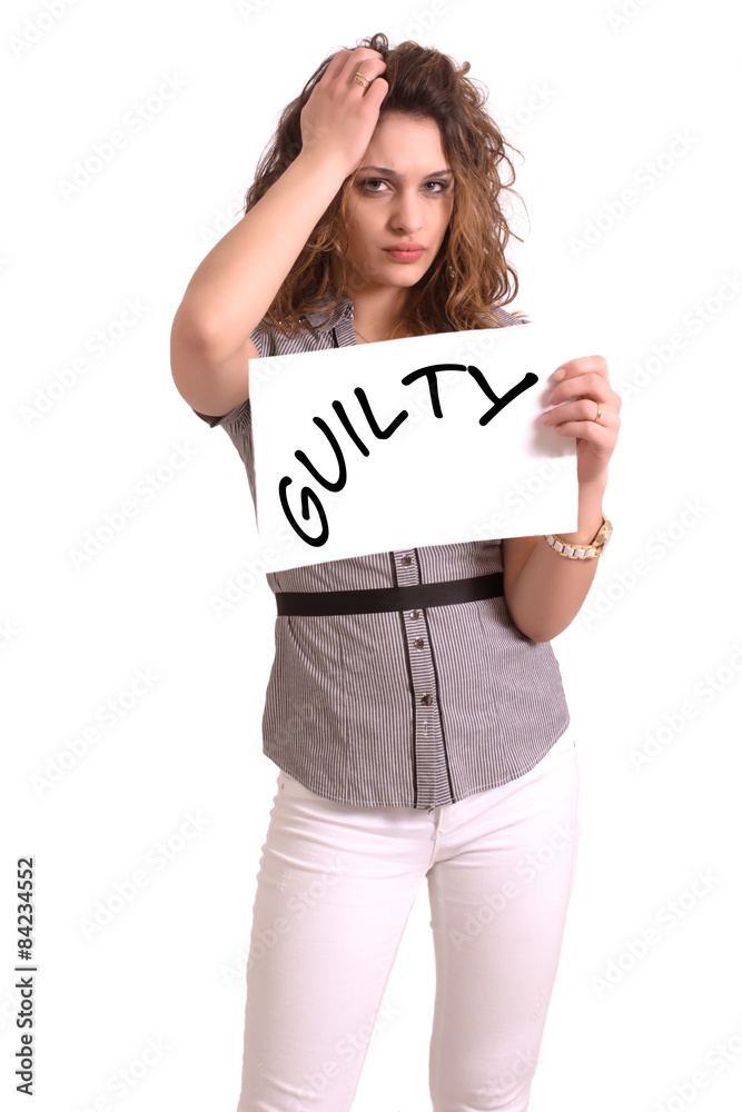 uncomfortable woman holding paper with Guilty text