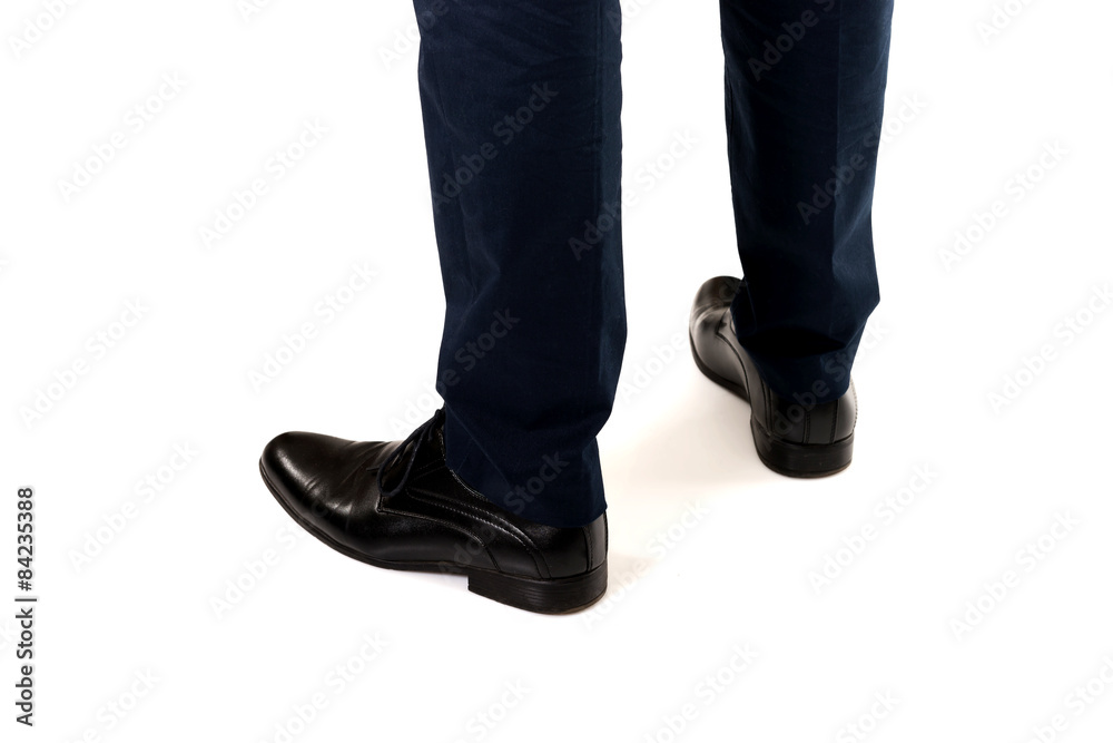 Close-up of businessman feet in black boots Close-up of businessman feet in black boots