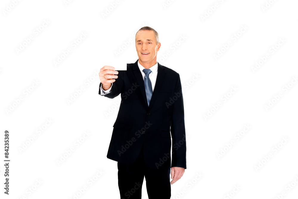 Businessman showing a blank identity name card Businessman showing a blank identity name card