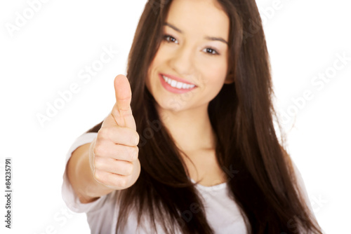 Happy woman with thumbs up.