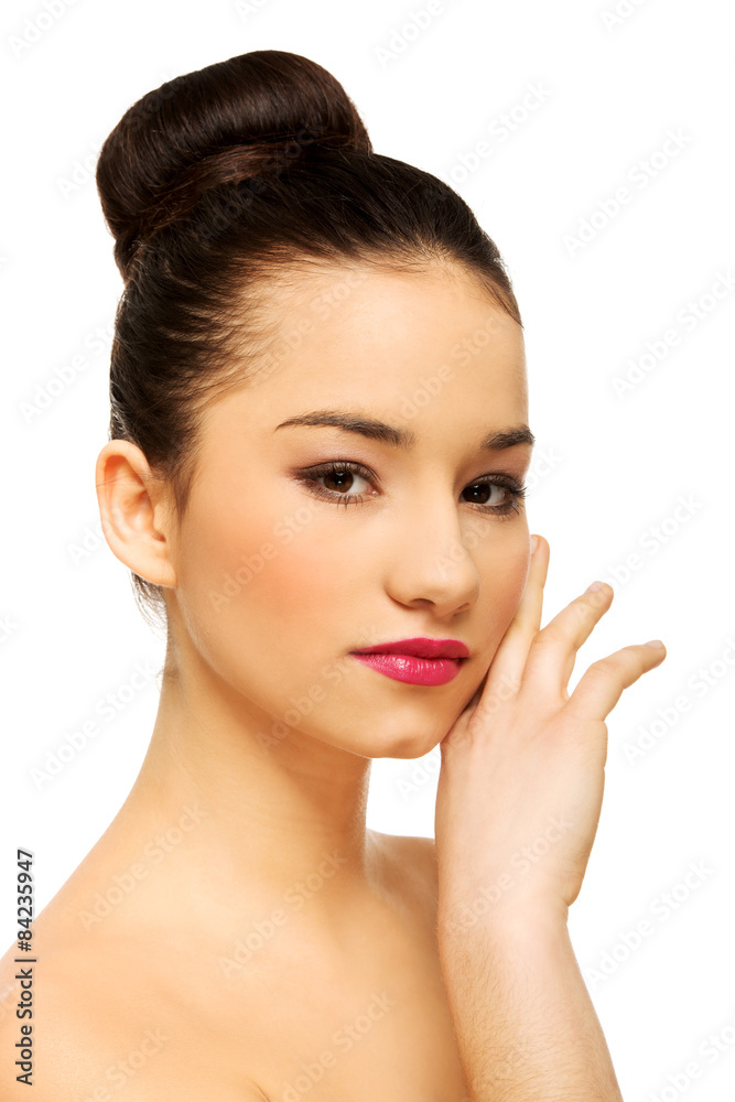 Woman with full make up touching face. Woman with full make up touching face.