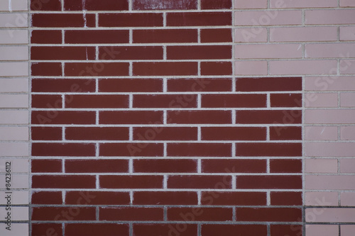 brick wall of different colors with geometric shapes 