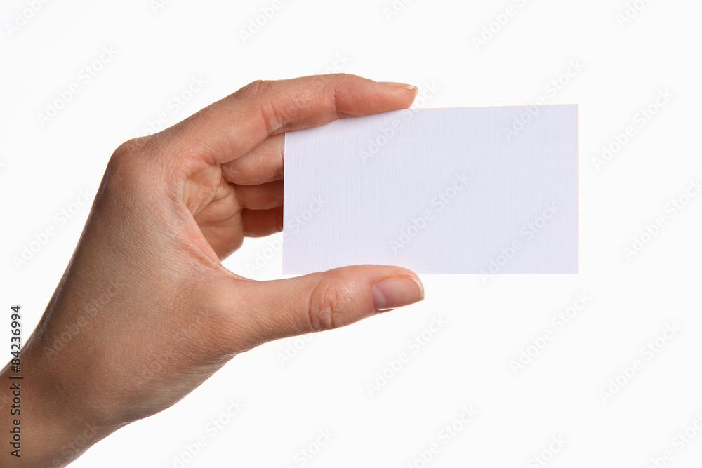 Obraz premium Female hand holding a blank business card