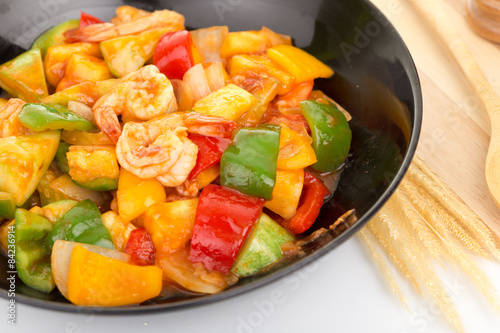 Sauted mixed vegetables and shrimp with tomato sauce