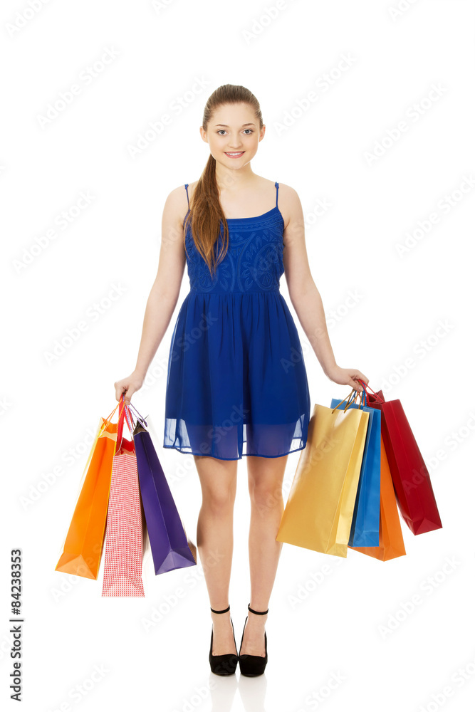 Young woman with shopping bags.