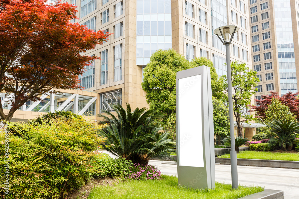 Blank billboard in front of the modern building Blank billboard in front of the modern building