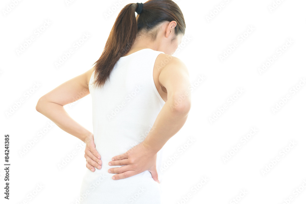 腰痛をうったえる女性