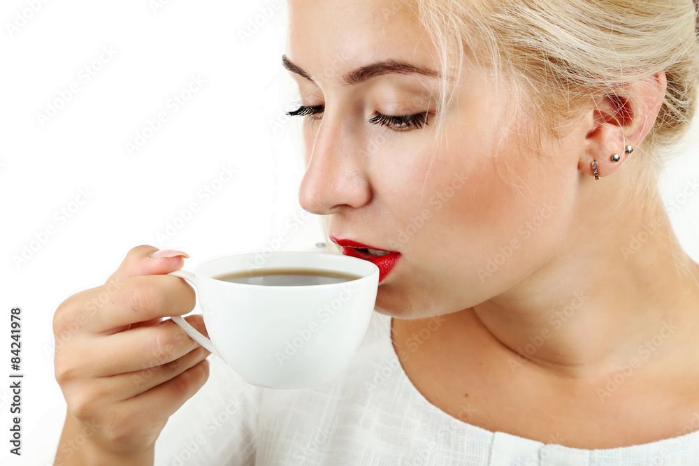 Young beautiful girl drinking coffee Young beautiful girl drinking coffee
