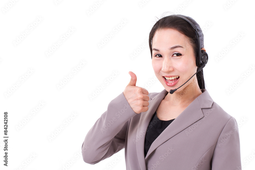 happy female customer service executive giving thumb up hand ges happy female customer service executive giving thumb up hand ges