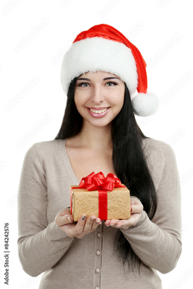 Beautiful woman in christmas hat with christmas gift Beautiful woman in christmas hat with christmas gift