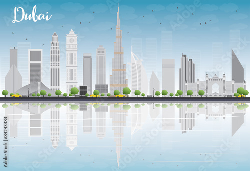 Dubai City skyline with grey skyscrapers and blue sky
