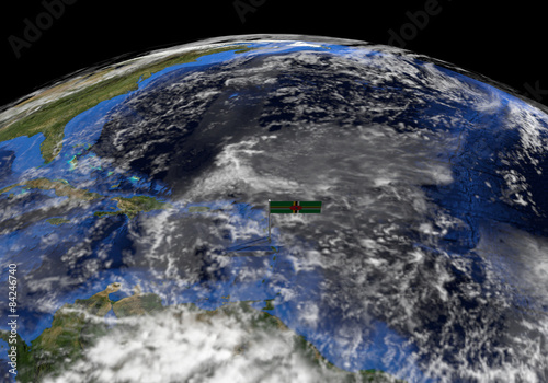 Fototapeta Naklejka Na Ścianę i Meble -  Dominica flag pole on earth illustration - Elements by NASA