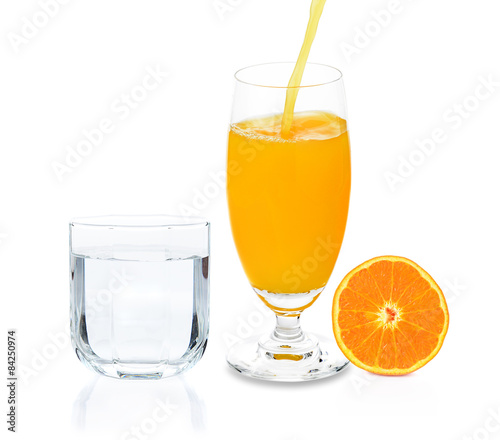 orange juice and slice orange and drinking water on white backgr