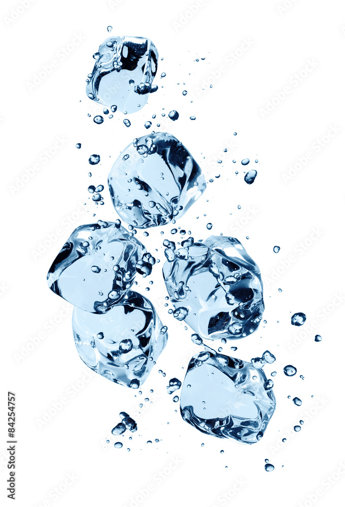 Ice cubes in water splashes isolated on white Ice cubes in water splashes isolated on white