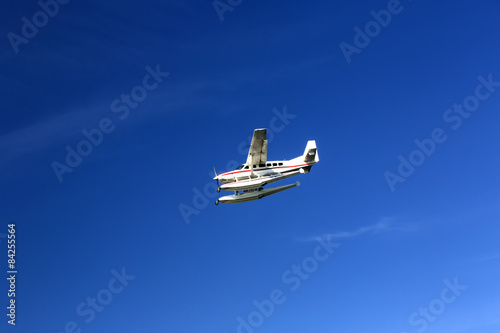 seaplane fly high in the blue sky © lester120