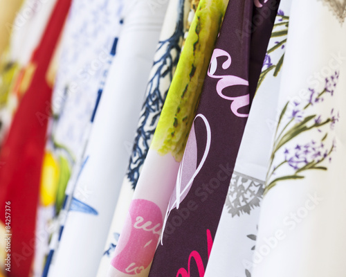 various textile products from natural fabrics on a show-window