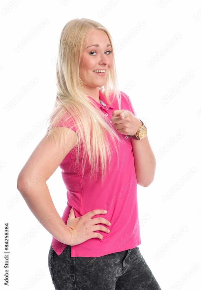 Blondes Mädchen ist schadenfroh und zeigt auf etwas Blondes Mädchen ist schadenfroh und zeigt auf etwas