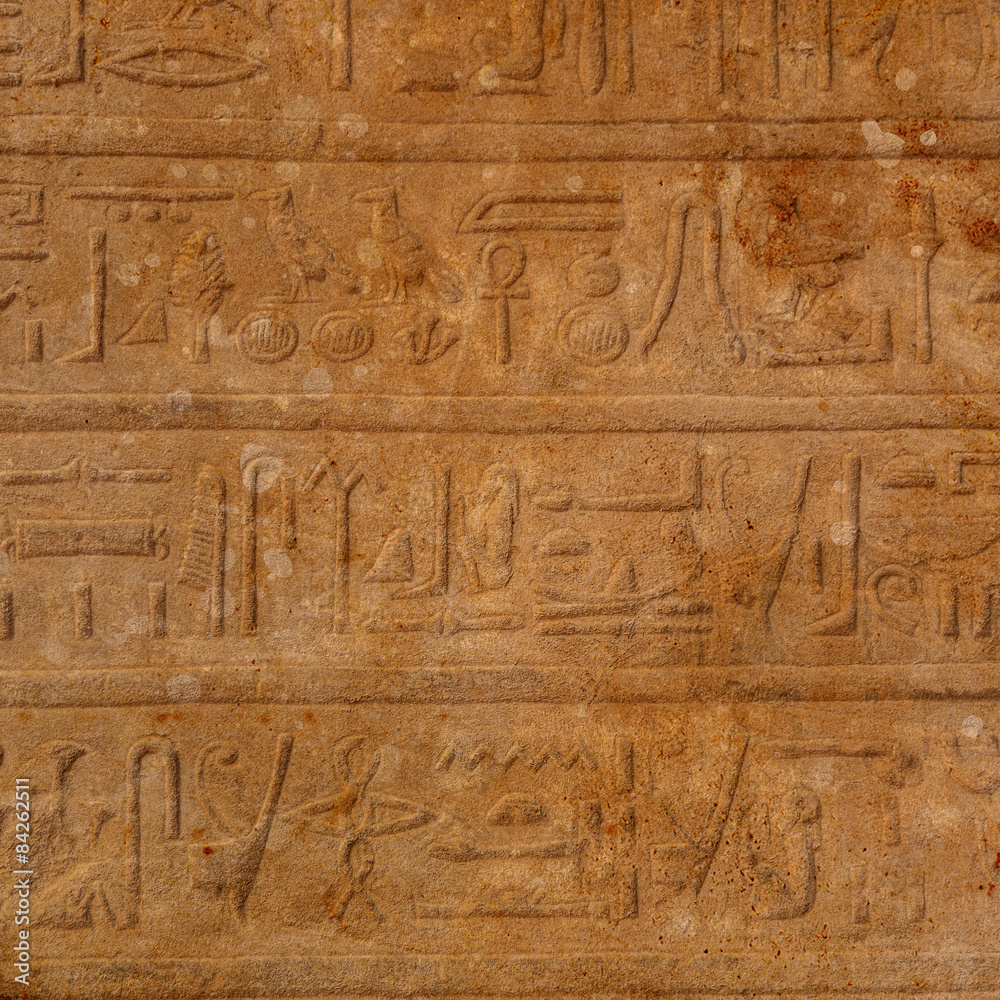 old egypt hieroglyphs carved on the stone