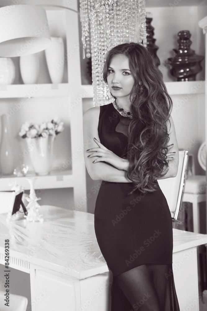 Black and white portrait of a stunning fashionable model posing Black and white portrait of a stunning fashionable model posing