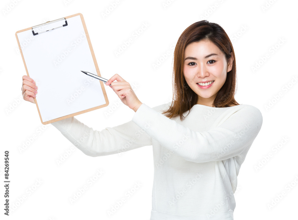 Beautiful woman pen point to clipboard Beautiful woman pen point to clipboard