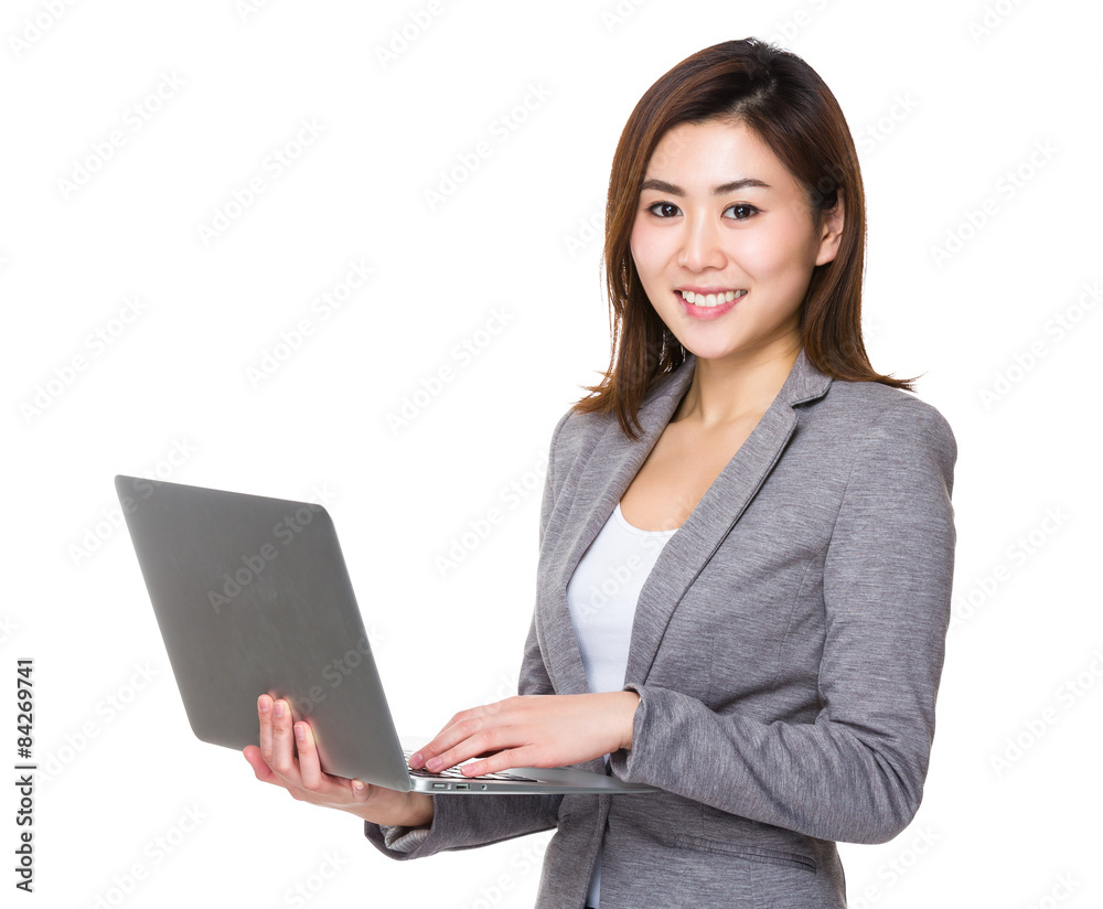 Businesswoman use of laptop computer Businesswoman use of laptop computer