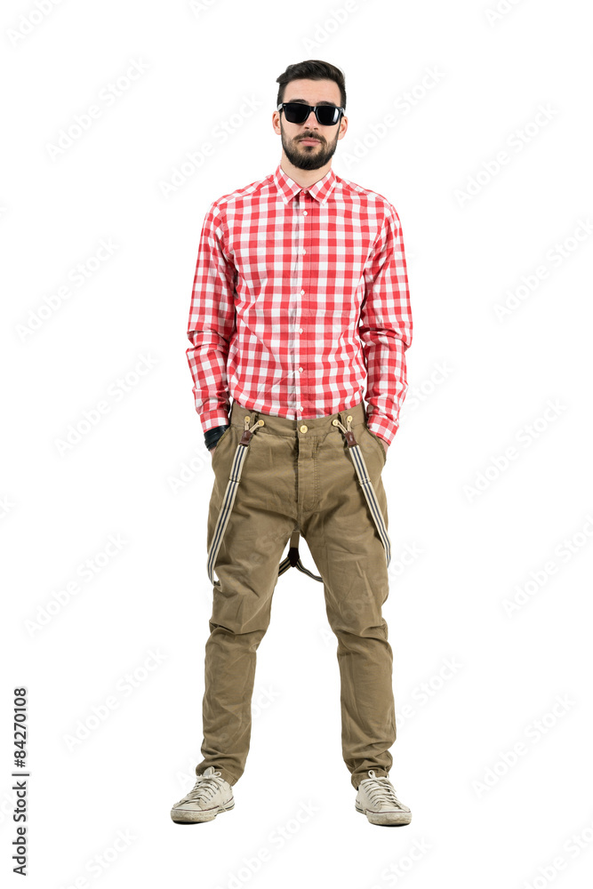 Man in retro clothes standing with hands in pockets Man in retro clothes standing with hands in pockets