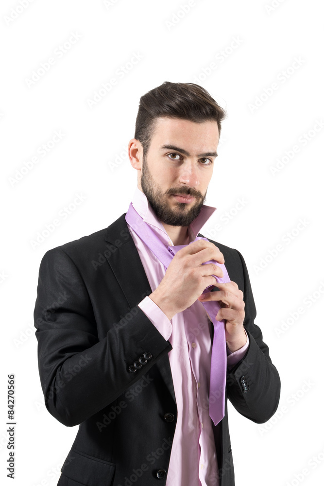 Young business tying necktie isolated Young business tying necktie isolated