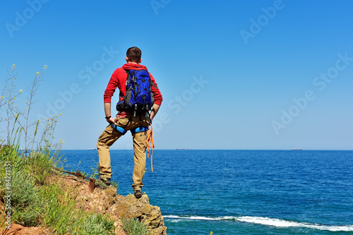 rock climber looking to sea