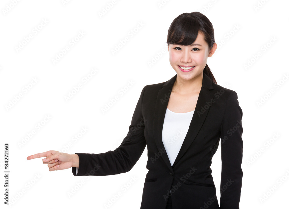 Asian businesswoman with finger point aside Asian businesswoman with finger point aside