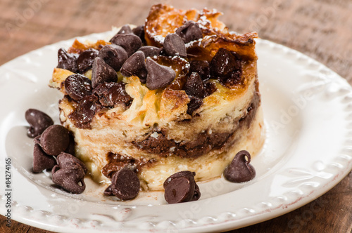 Chocolate chip bread pudding on plate