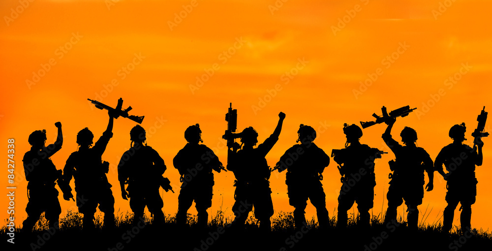 Silhouette of military team soldiers or officers with weapons