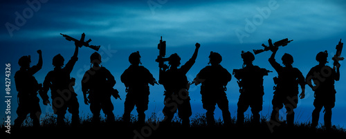 Fotografia, Obraz Silhouette of military team soldiers or officers with weapons