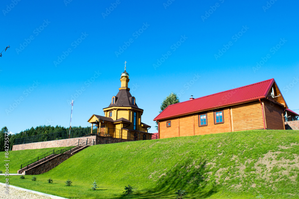 Village russian orthodox church with glided cupola