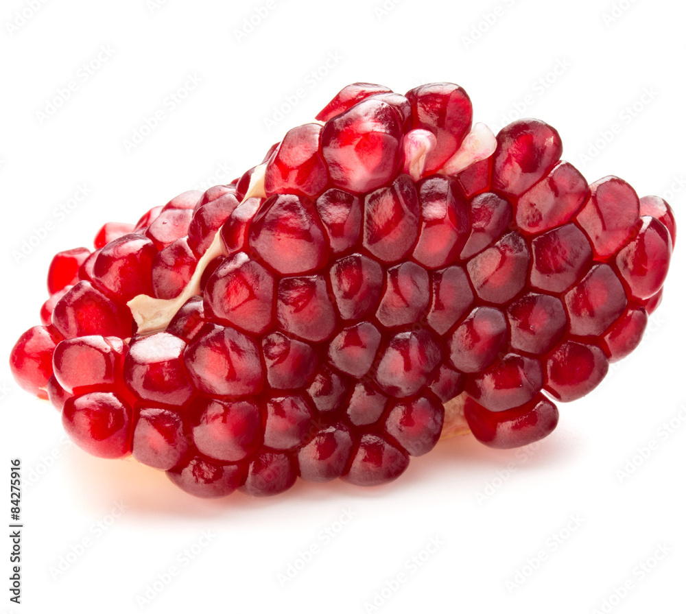 Ripe pomegranate fruit segment isolated on white background cuto