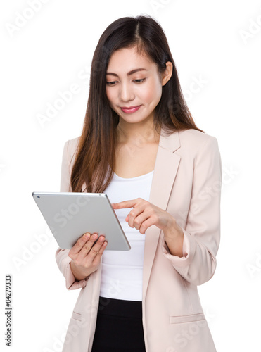 Young businesswoman use of tablet