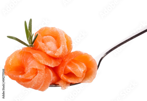 Tableau sur toile Salmon piece on fork isolated on white background cutout