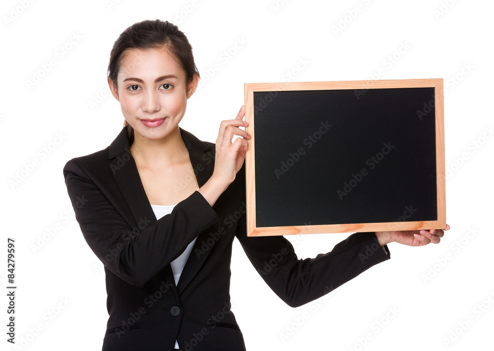 Young businesswoman hold with chalkboard