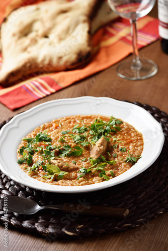 Soup Kharcho with flatbread and wine