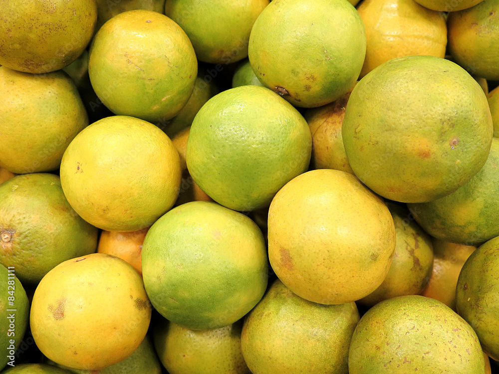 Closeup of fresh green oranges