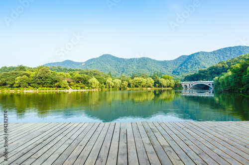 platform beside lake with morning in park © ABCDstock