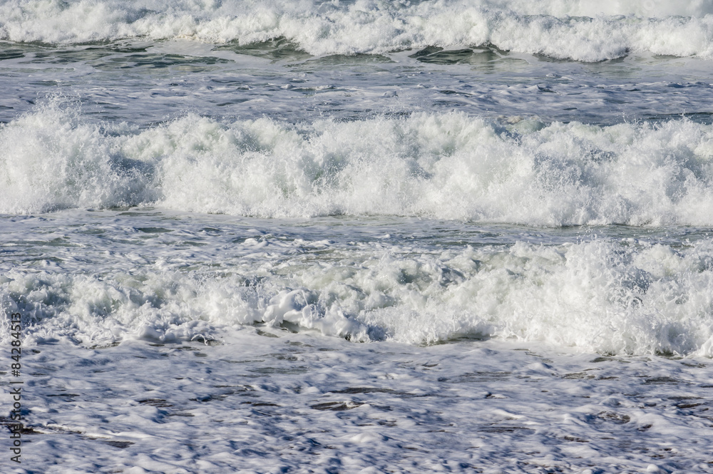 Obraz premium Waves at the beach on Pacific ocean