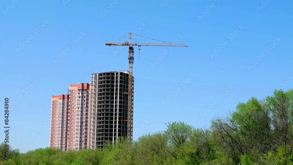 Derrick crane is used in the construction of tall buildings in Derrick crane is used in the construction of tall buildings in