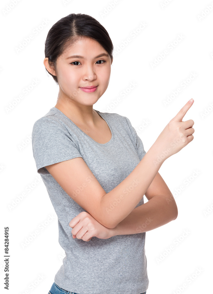 Young woman with finger point up Young woman with finger point up