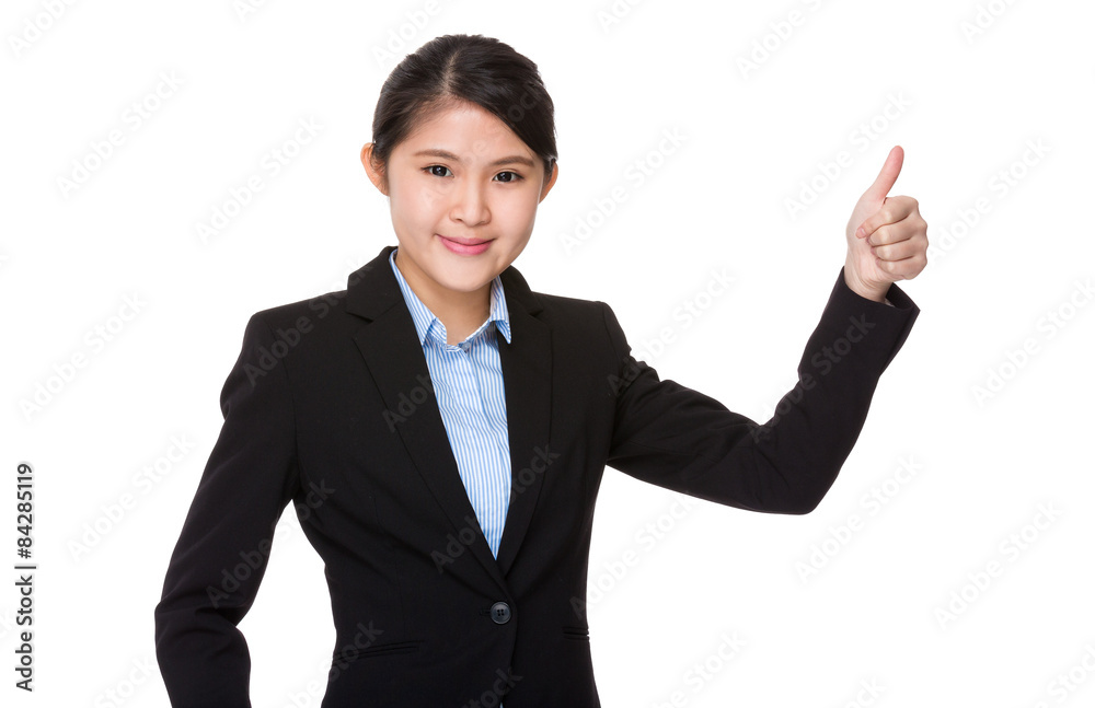 Young businesswoman with thumb up gesture Young businesswoman with thumb up gesture