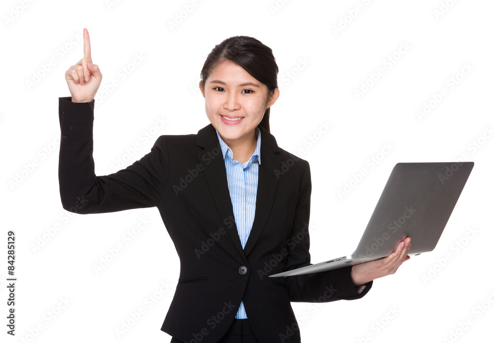 Young businesswoman use of laptop computer and thumb up Young businesswoman use of laptop computer and thumb up