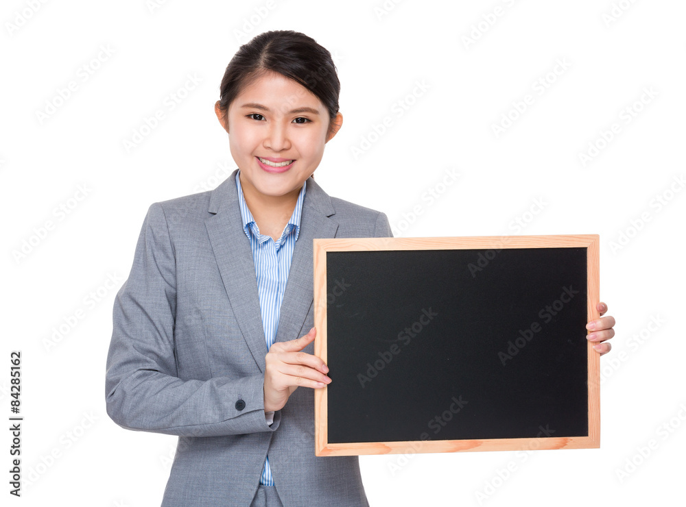Businesswoman show with the chalkboard Businesswoman show with the chalkboard